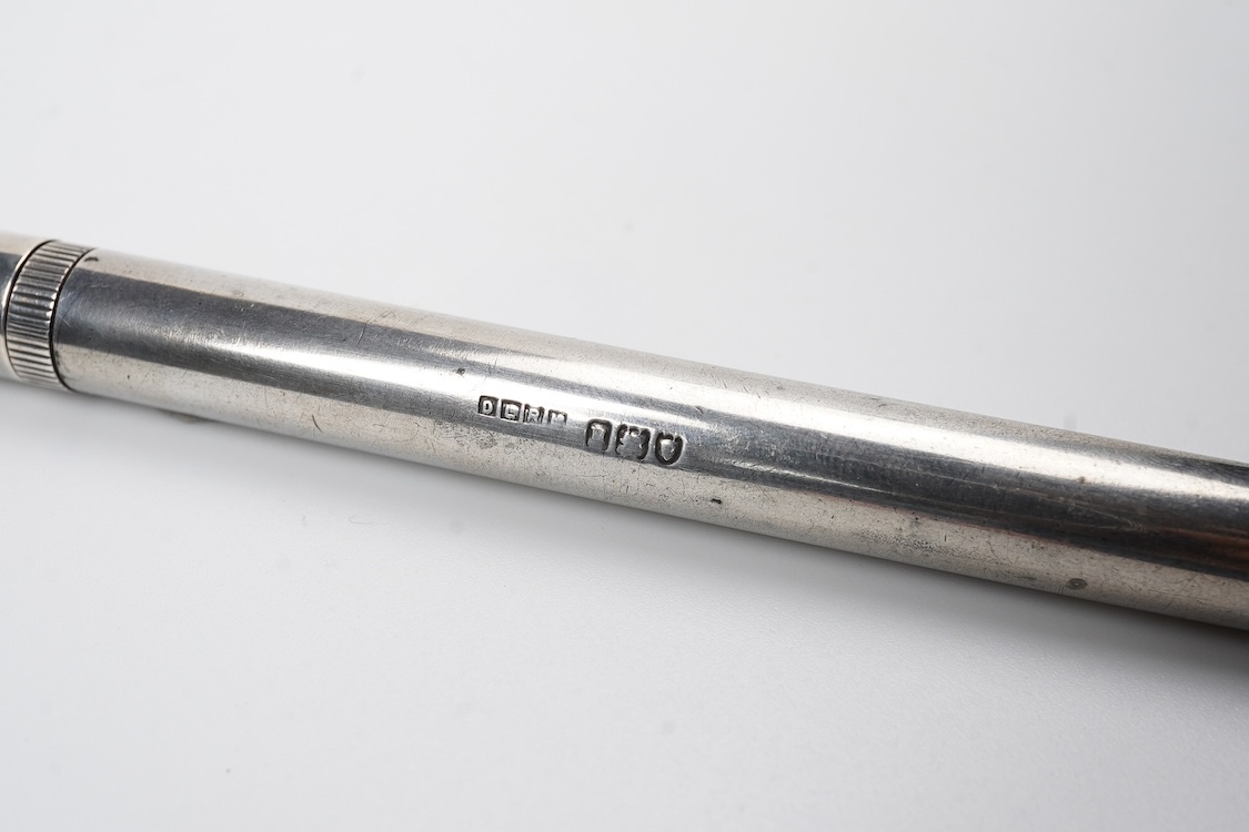 A De la Rue Onoto Sterling silver piston filler with fine flexible nib and over-and-under feed